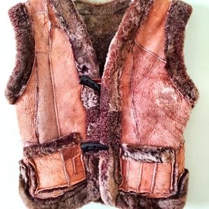 Vest made of sheep fur with pockets for 2-3 years old kids